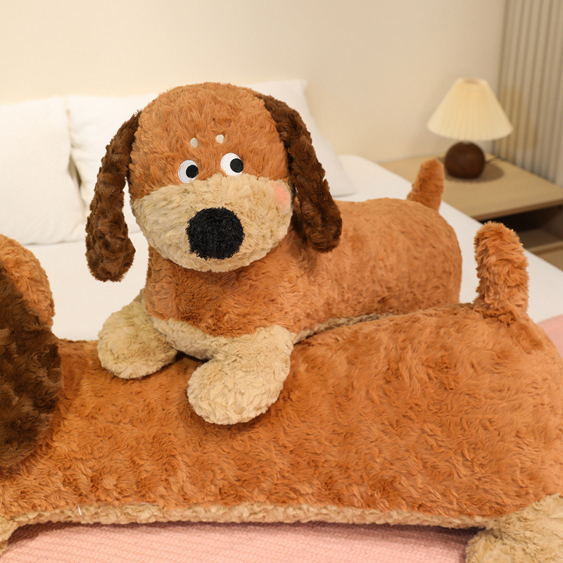 Dachshund Plush Pillows featuring playful stacked positioning, floppy ears, embroidered facial details, and soft plush fabric on a bed