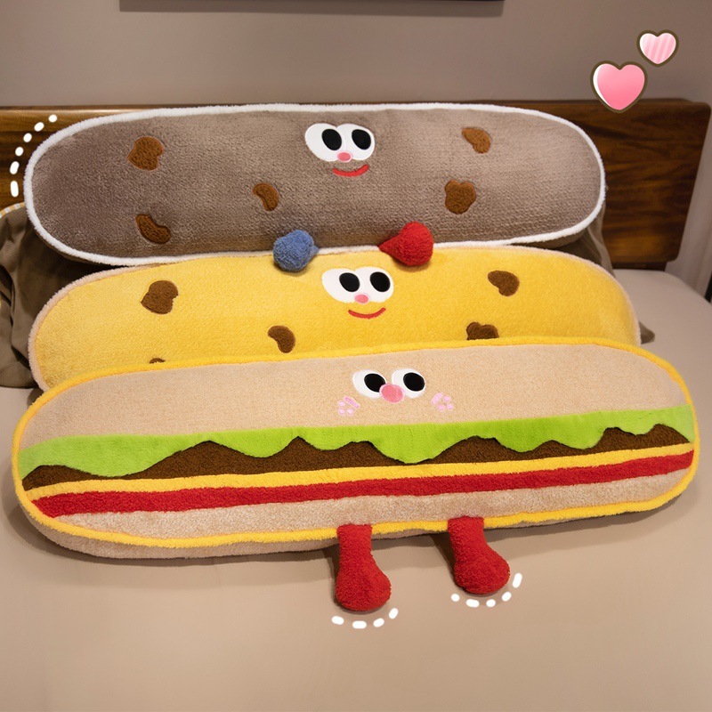 Hamburger and cookie plush pillows displayed together, featuring hamburger, yellow cookie, and brown cookie designs for cozy home decor, hugging, and lounging