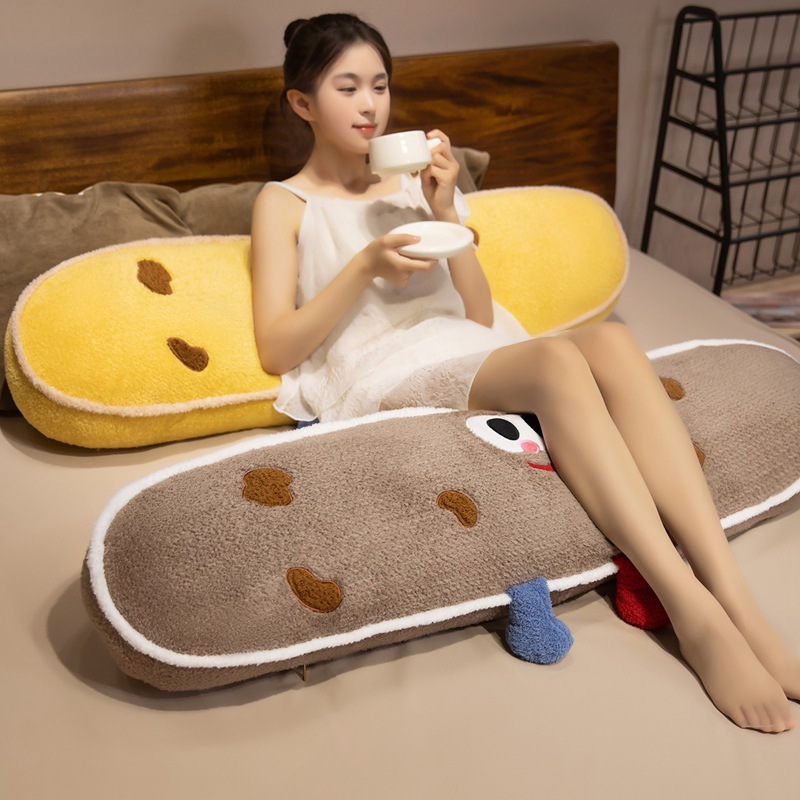 Brown and Yellow Cookie Plush Pillows providing soft support for lounging, sitting comfortably, and everyday relaxation on the bed