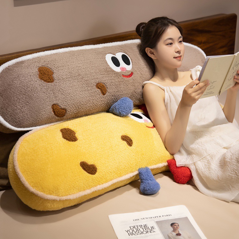 Yellow and Brown Cookie Plush Pillows used as soft backrest cushions for reading, relaxing, and creating a cozy bedroom atmosphere