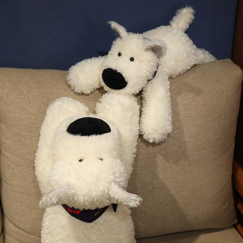 Two Bandana Dog Plush Toys displayed on a sofa, showcasing their fluffy white plush, playful puppy design, and cozy home decor appeal