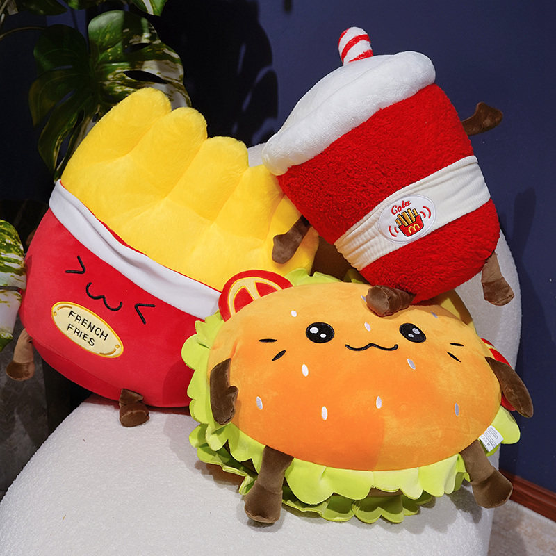 French Fries, Cola, and Hamburger Plush Pillows displayed together, highlighting soft plush fabric and cheerful food-inspired designs