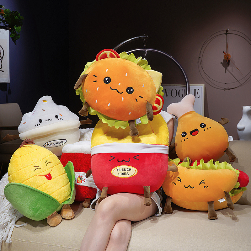 Hamburger, Hot Dog, French Fries, Chicken Drumstick, Ice Cream, Cola & Corn Plush Pillows displayed together, showcasing adorable food-inspired designs for cozy home decor