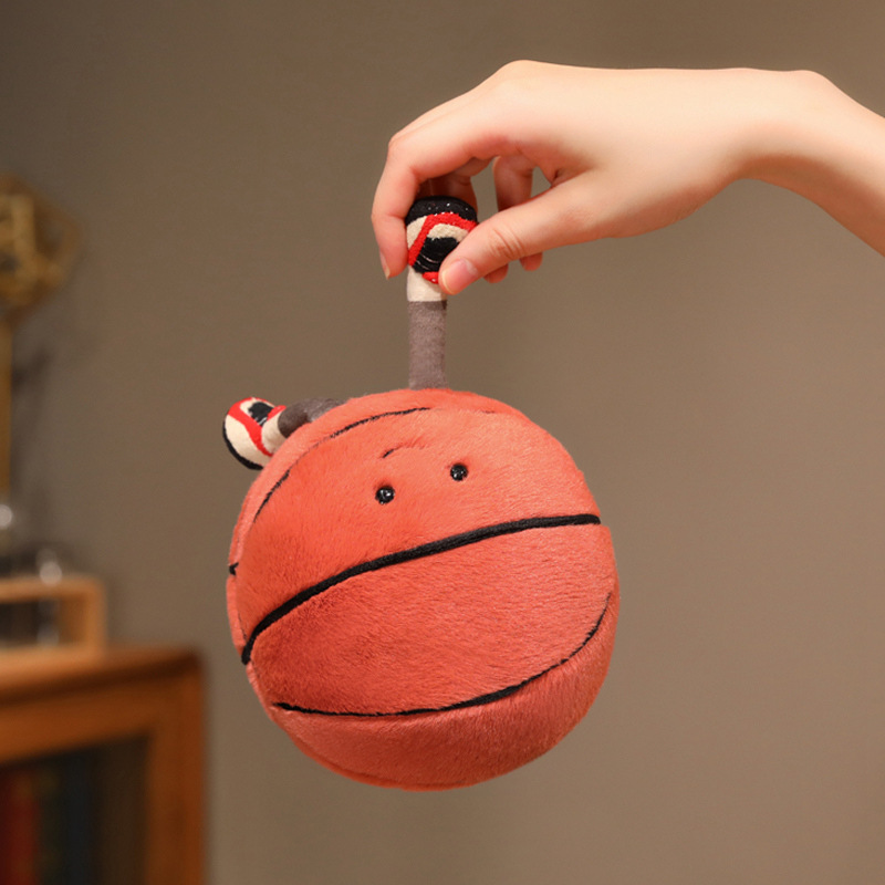 Basketball Plush Toy featuring adorable dangling legs, a cute smiling basketball design, and soft plush fabric for cuddling, display, and playful home decor