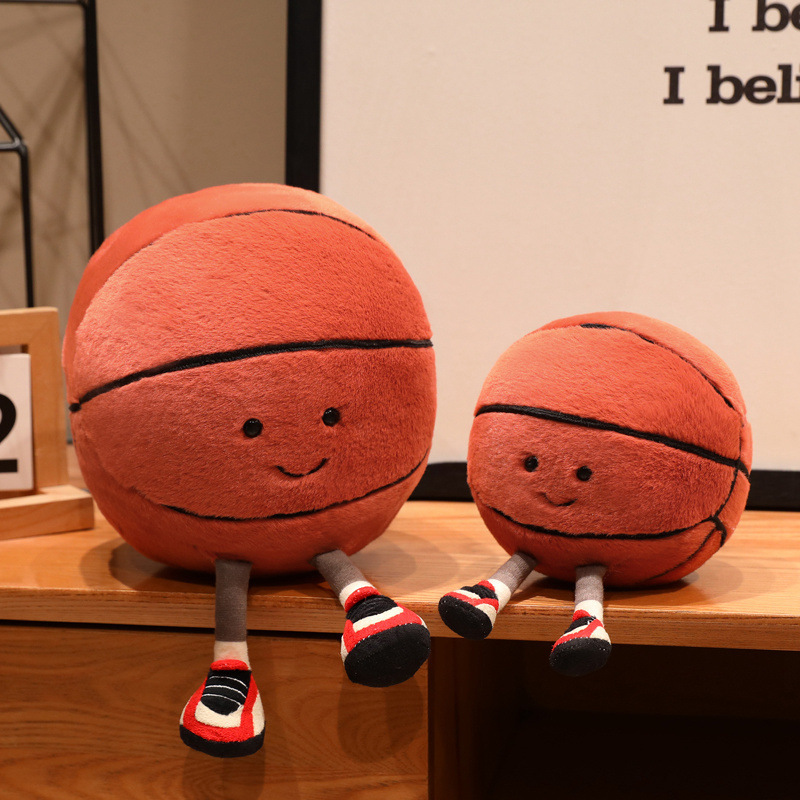 Basketball Plush Toy in two sizes featuring a cheerful smiling design, soft plush fabric, and adorable dangling legs, perfect for display, collecting, and decorating