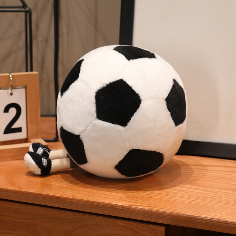 Side view of the Soccer Ball Plush Toy showcasing its round shape, soccer ball pattern, and soft plush fabric