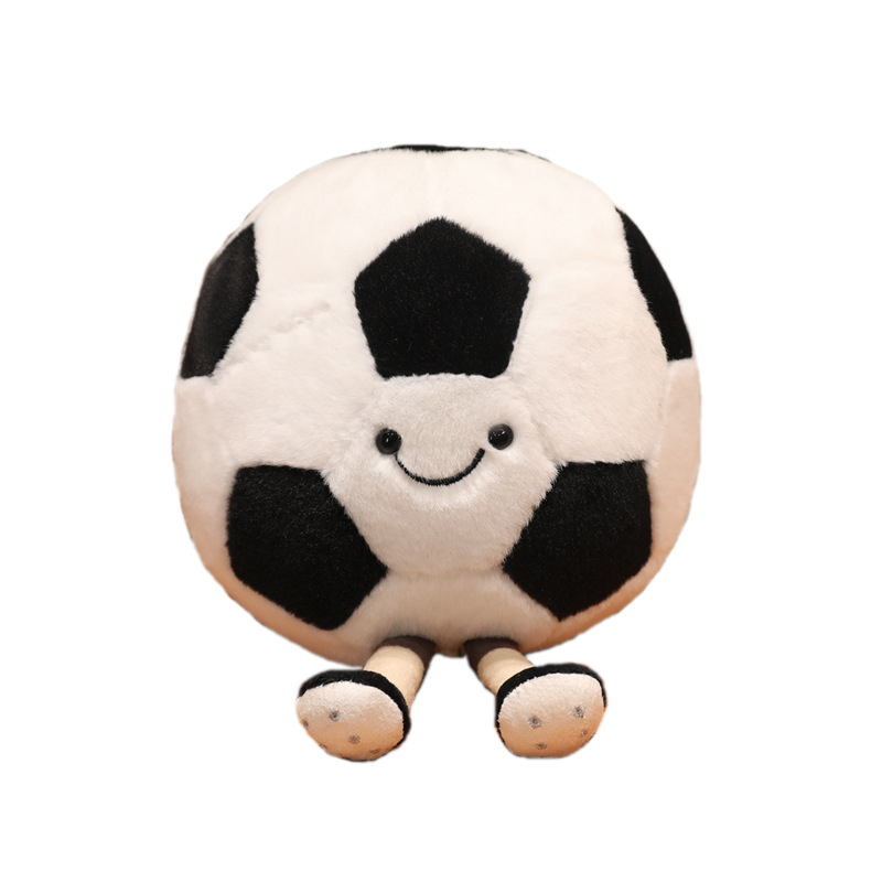 Soccer Ball Plush Toy with smiling face, soft plush fabric, and cute dangling legs on a white background