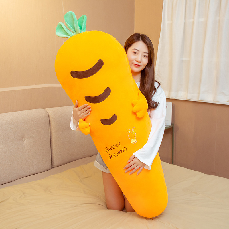 Carrot Plush Pillow featuring soft plush fabric, a long body design, embroidered details, and PP cotton filling