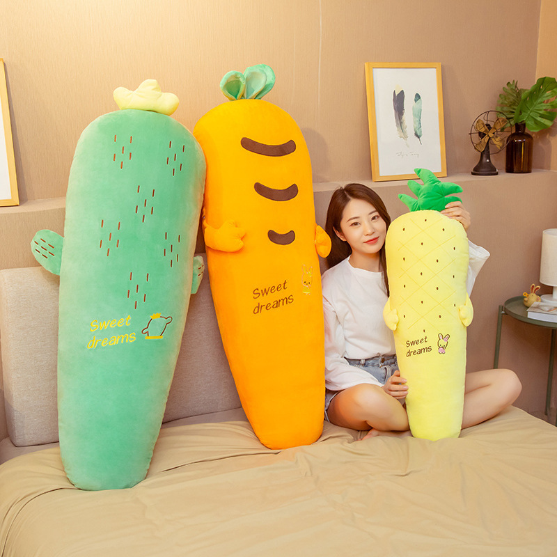 Cactus, Carrot, and Pineapple Plush Pillows displayed together, featuring soft plush fabric and a long body design for hugging, lounging, bedroom decor, and cozy relaxation