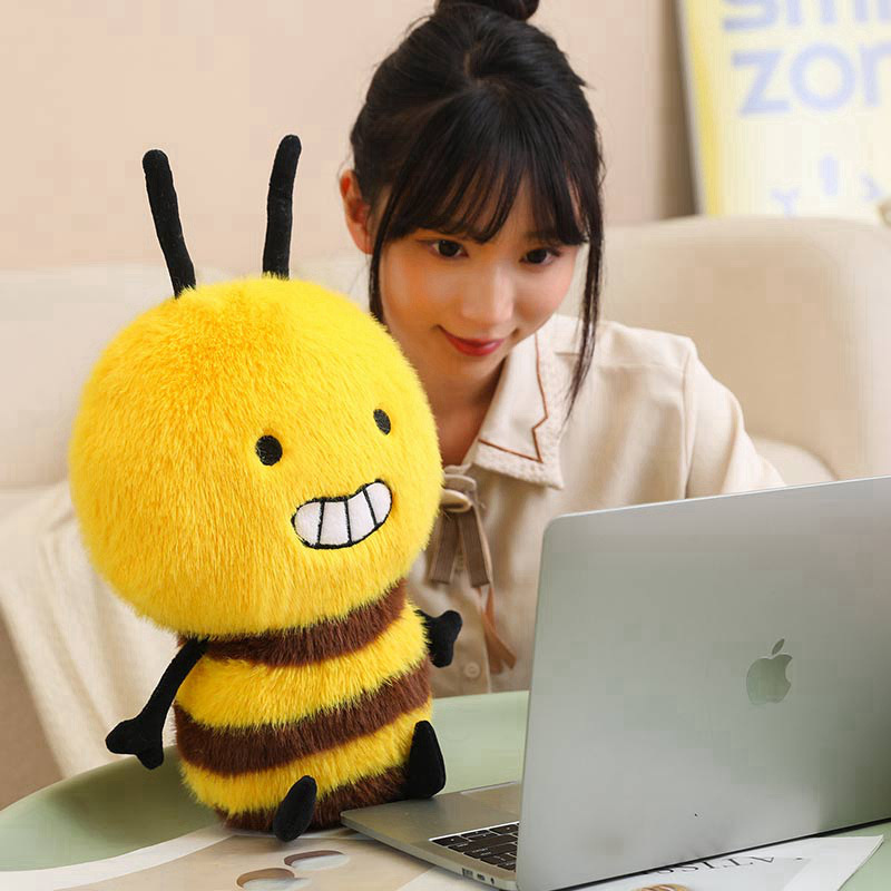 Bee Plush Toy with a smiling bumblebee design and soft plush fabric, adding a cute and cozy touch to a desk, workspace, or reading corner