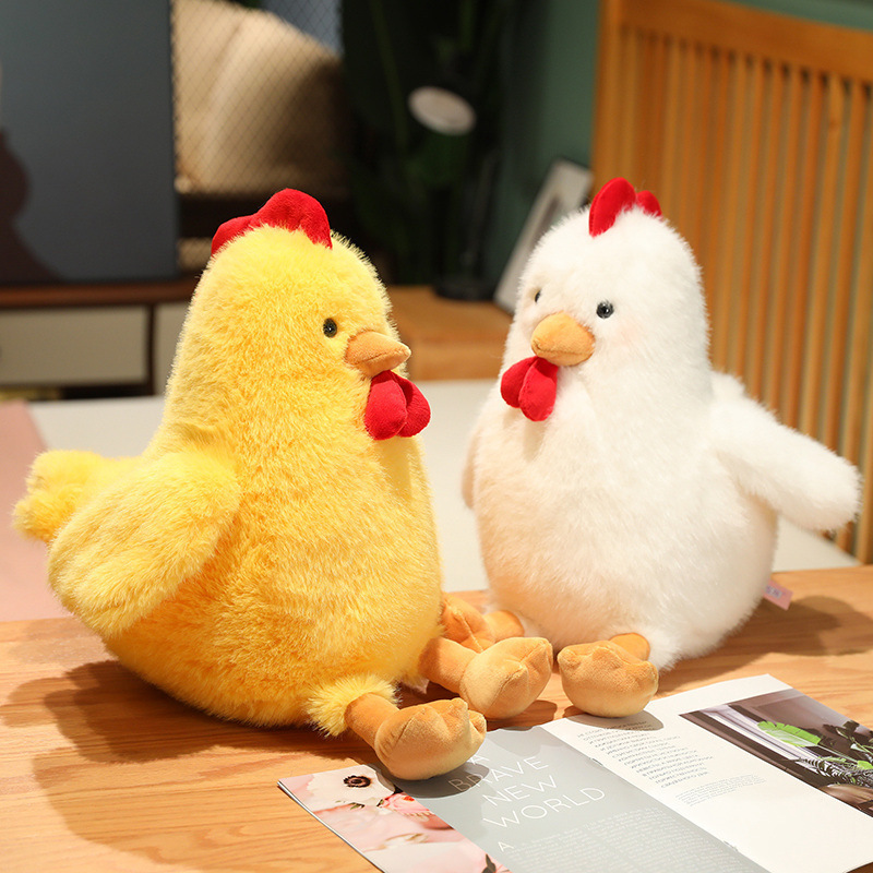 Yellow and White Cute Chicken Plush Toys on a desk, featuring fluffy plush fabric and a cute round chicken design