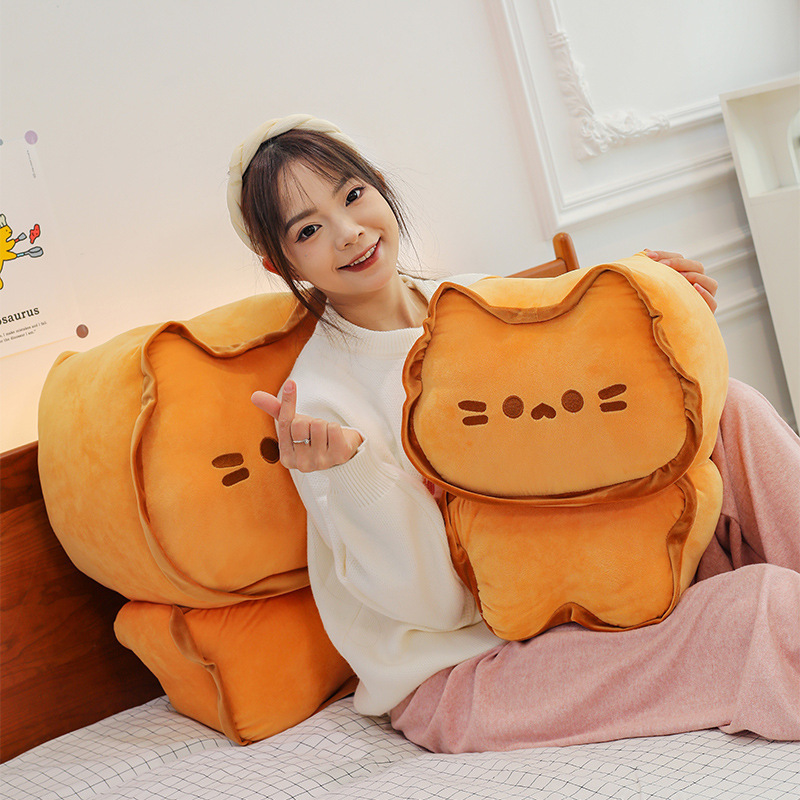 Biscuit Cat Plush Pillow in a cozy bedroom setting, highlighting its soft plush texture, cute biscuit-inspired cat design, and comfortable shape for hugging and lounging