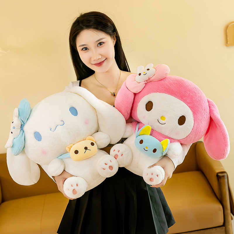 Cinnamoroll and My Melody plush toys with mini crossbody bags displayed together, showcasing their soft plush fabric and cute character designs for cuddling and decorating cozy spaces