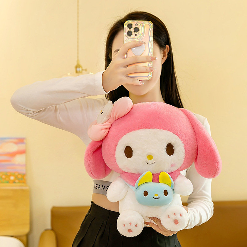 My Melody plush toy with a mini crossbody bag being held to showcase its soft plush fabric, floppy ears, and cute character design