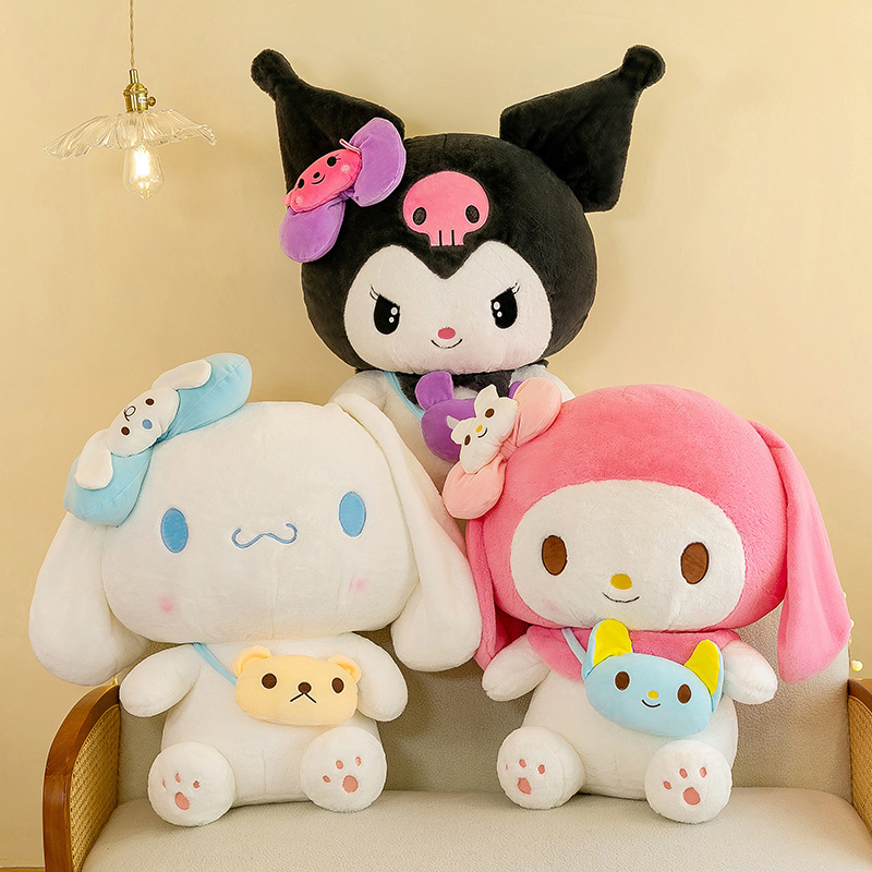 Kuromi, My Melody, and Cinnamoroll plush toys with mini crossbody bags displayed together on a sofa, perfect for collecting, displaying, and decorating cozy spaces