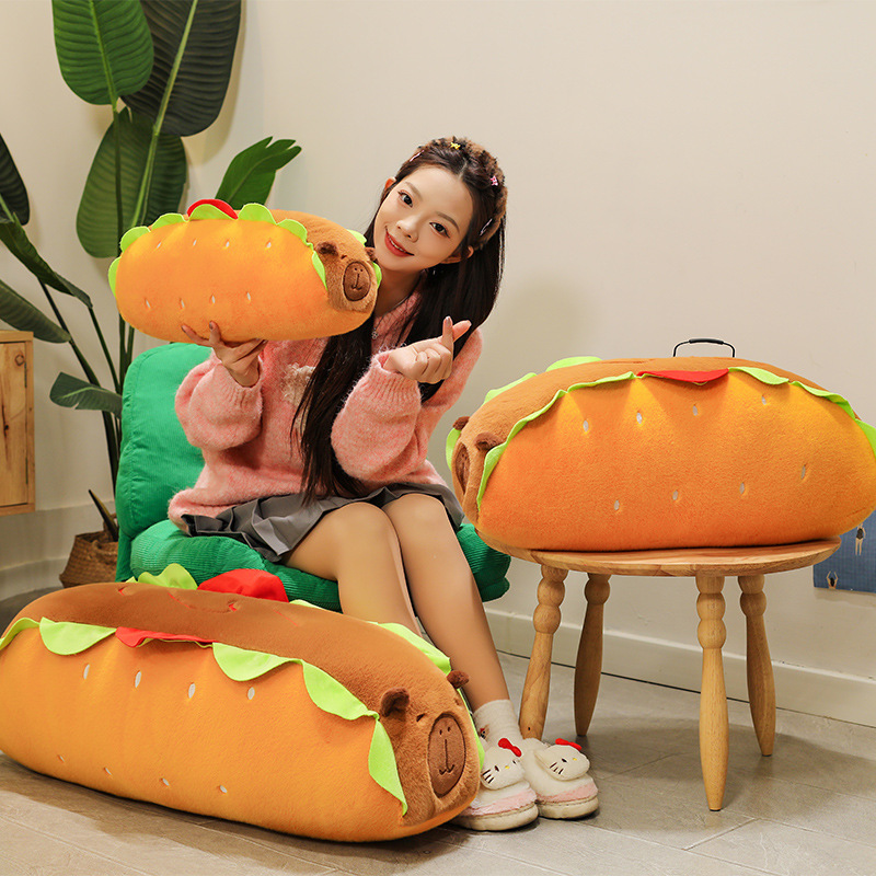 Hot Dog Capybara Plush Pillow displayed in multiple sizes, adding a playful food-inspired touch to cozy living spaces and home decor