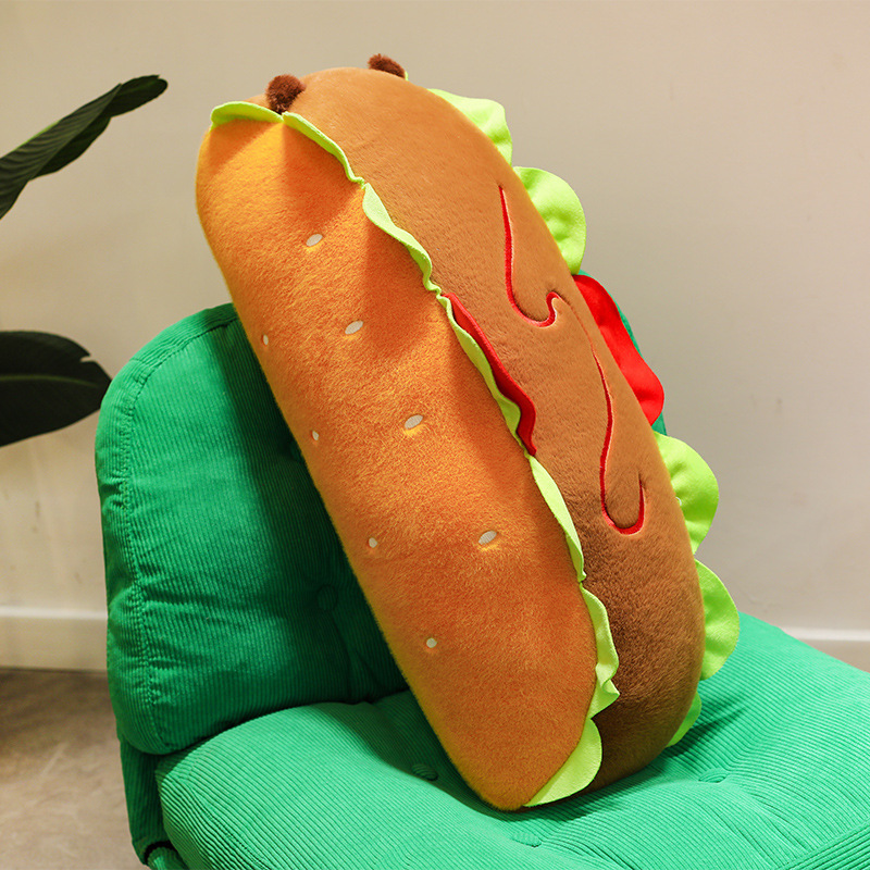 Hot Dog Capybara Plush Pillow showcasing its long body shape, soft plush texture, and playful hot dog-inspired design as a charming home accent