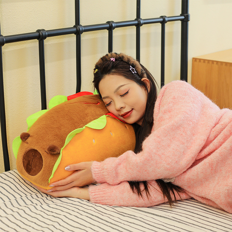 Hot Dog Capybara Plush Pillow with a long huggable shape, providing soft support for cuddling, lounging, and creating a warm, cozy atmosphere