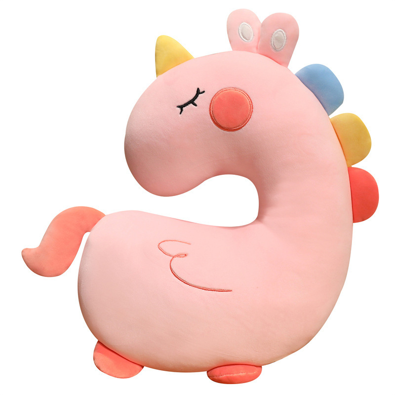 Pink Unicorn Plush Pillow featuring soft plush fabric, embroidered details, and a curved design for hugging, relaxing, and home decor