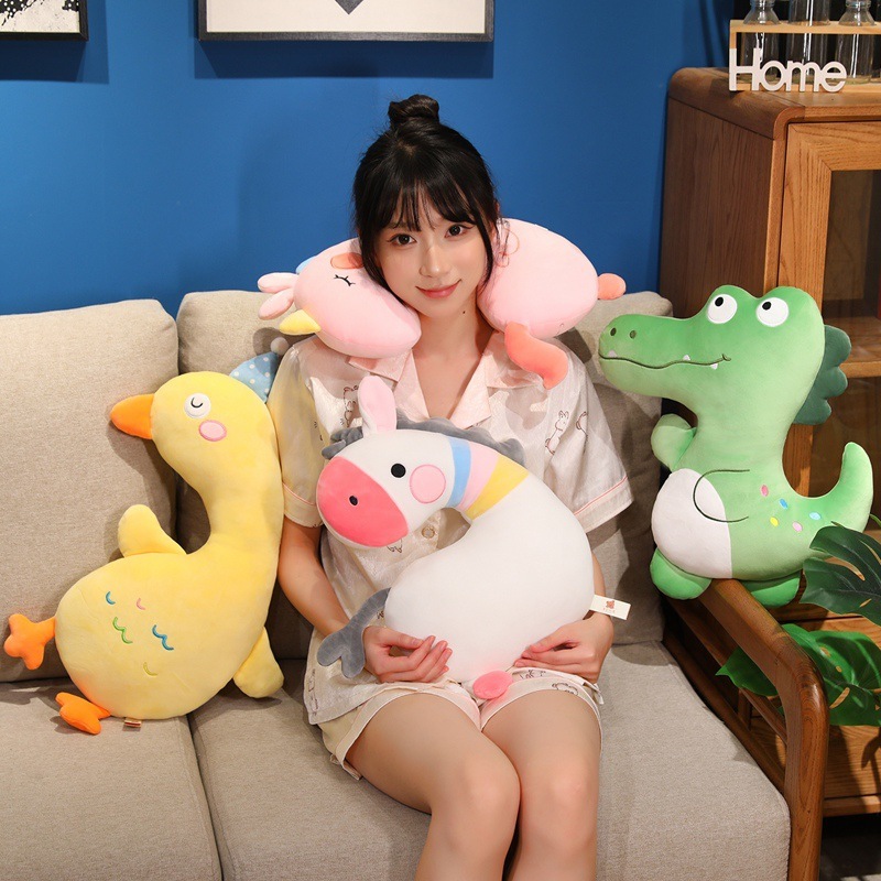 Unicorn, Duck, Zebra and Crocodile Plush Pillows displayed in a cozy living space, highlighting their soft plush design for relaxing, hugging, and everyday comfort