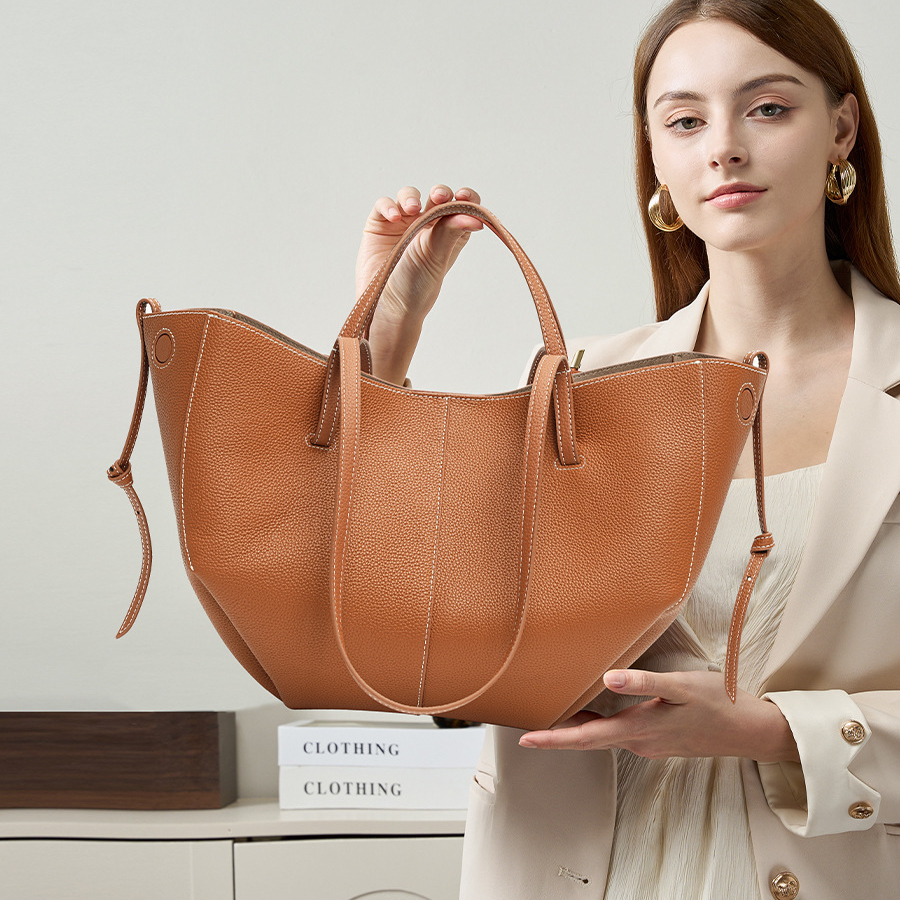 Model showcasing Urban Commuter Leather Tote Bag in Brown