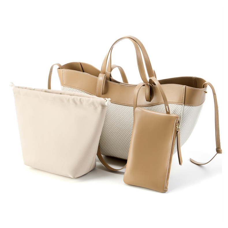 Wing Curve Leather Tote Bag in Apricot – Angled View with Inner Pouch and Mini Zip Pouch