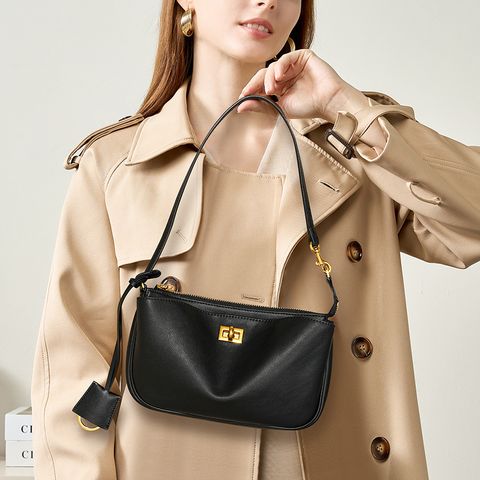 Model showcasing Rodeo Genuine Leather Baguette Bag in Black