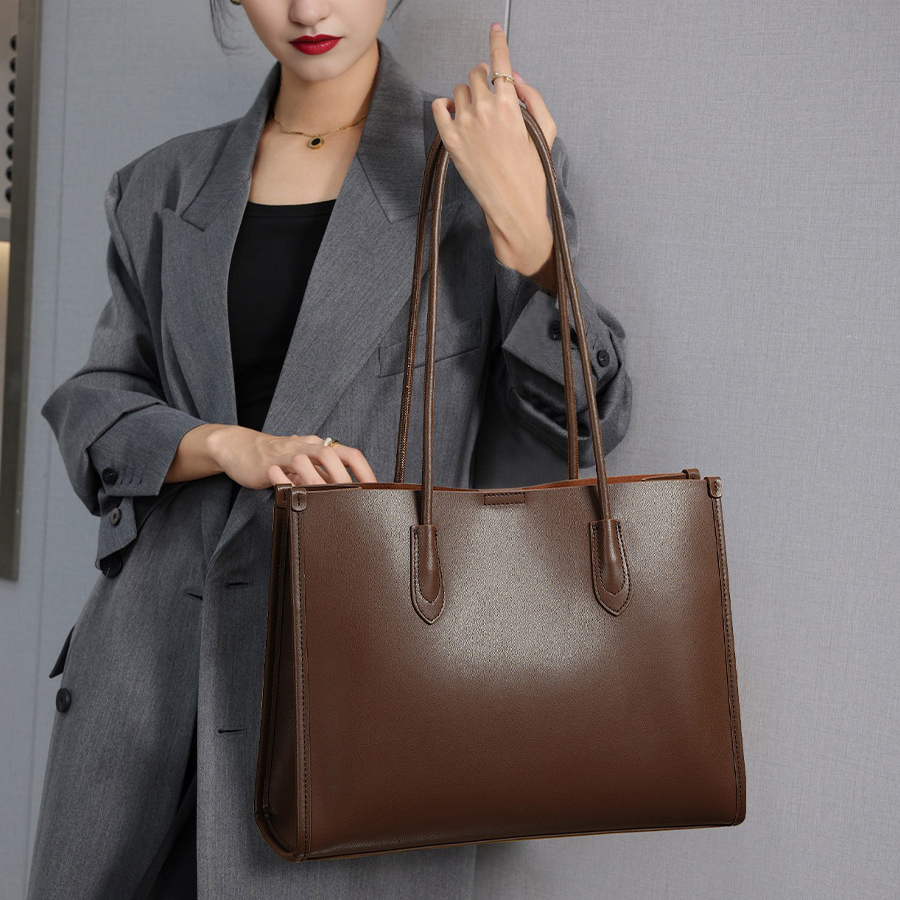 Model showcasing Premium Structured Leather Tote Bag in Coffee