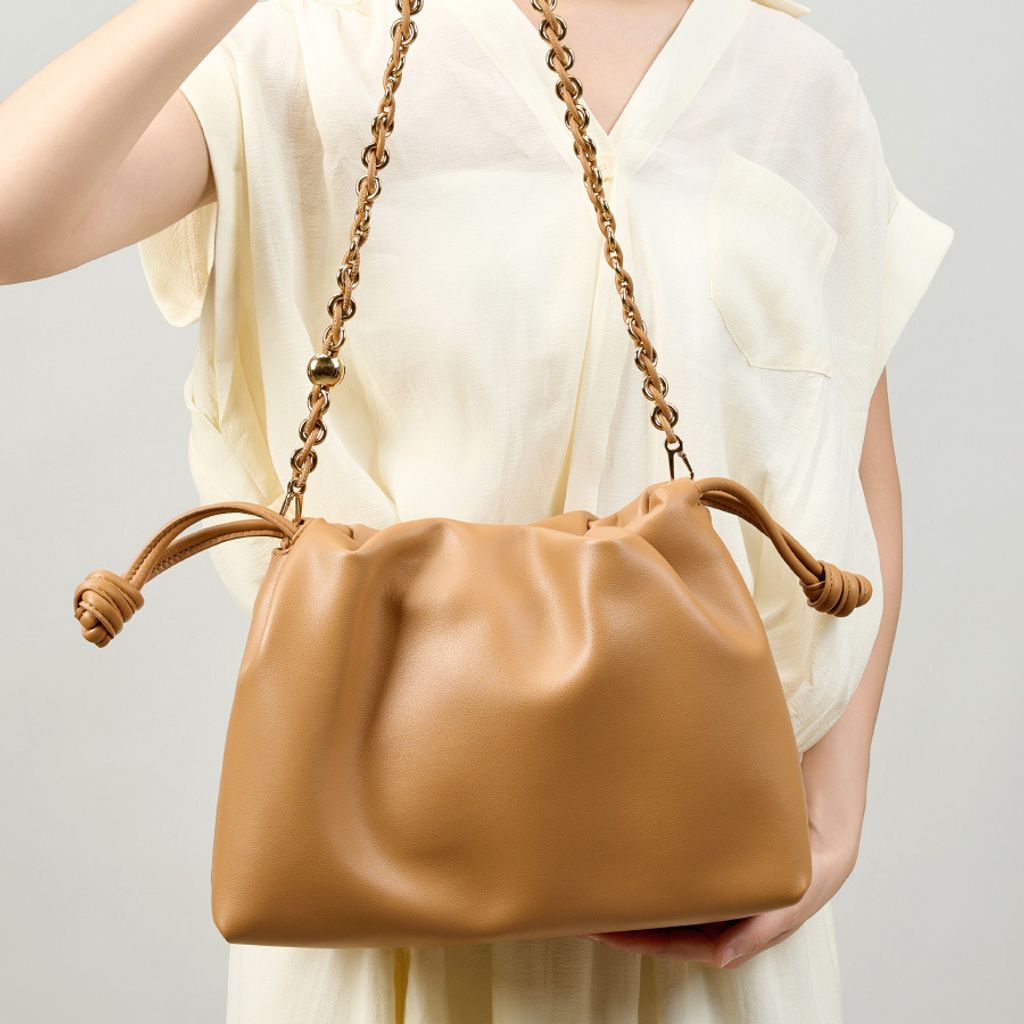 Model showcasing Elegant Genuine Leather Cloud Bag in Brown