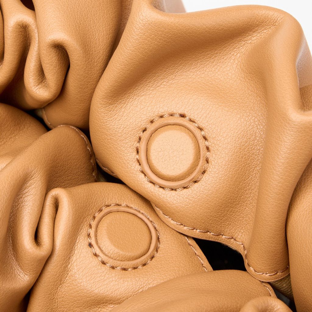Elegant Genuine Leather Cloud Bag – Magnetic Snap Closure Detail