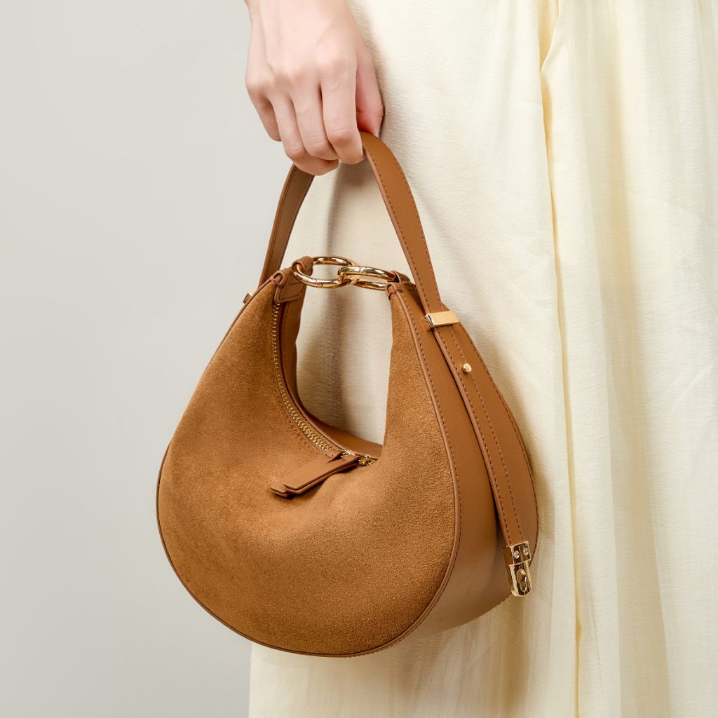 Model showcasing Refined Luna Genuine Leather Half Moon Bag in Fallen Leaf Yellow
