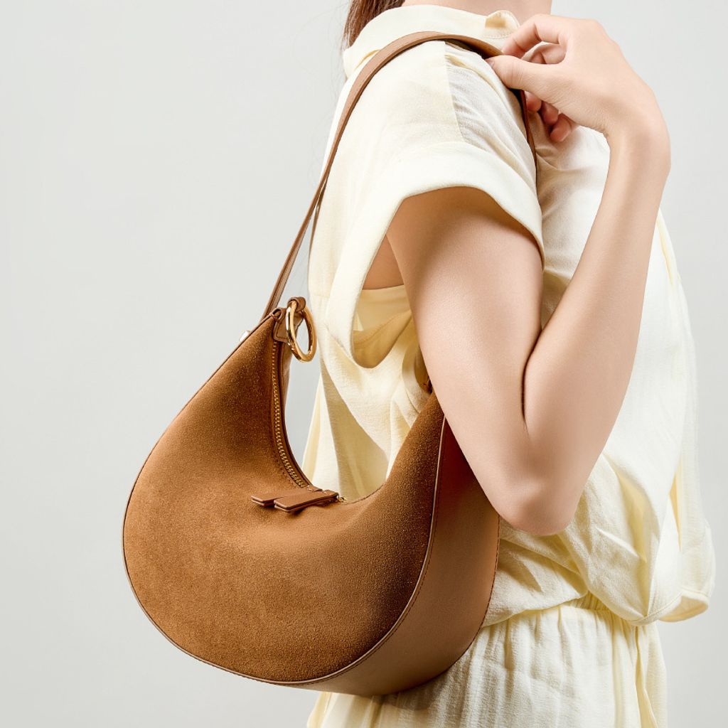 Model showcasing Refined Luna Genuine Leather Half Moon Bag in Fallen Leaf Yellow