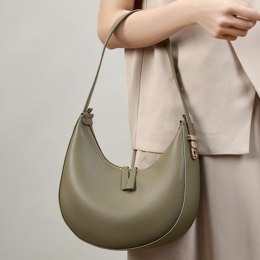 Model showcasing Refined Luna Genuine Leather Half Moon Bag in Gray Green