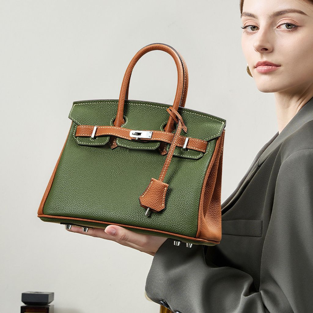 Model with Premium Togo Leather Structured Two-Tone Top Handle Bag