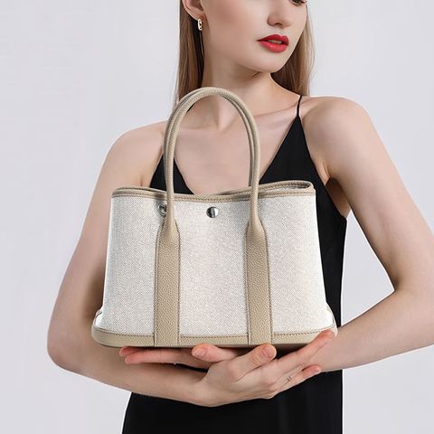 Model featuring Premium Genuine Leather and Canvas Structured Tote Bag in Elephant Gray