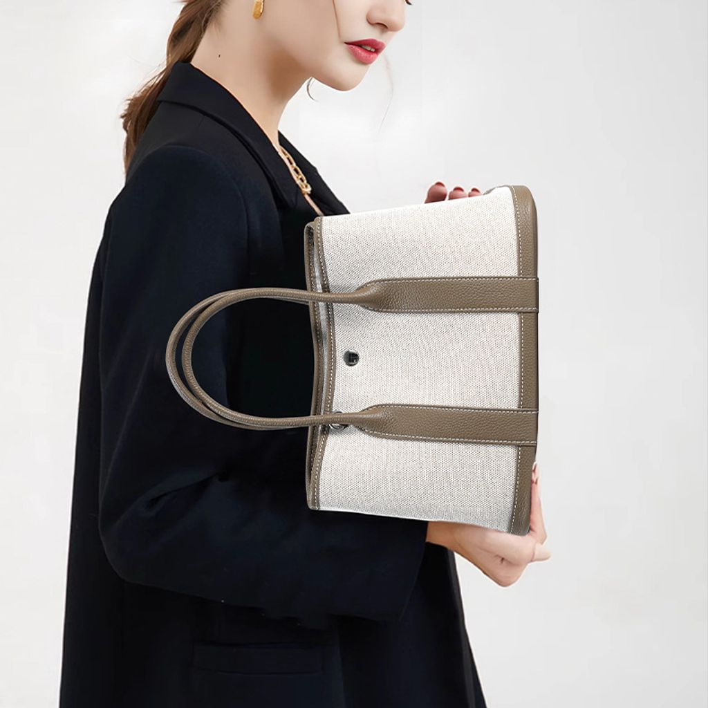 Model featuring Premium Genuine Leather and Canvas Structured Tote Bag in Khaki
