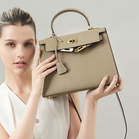 Model showcasing Premium Genuine Leather Structured Top Handle Bag in Elephant Gray