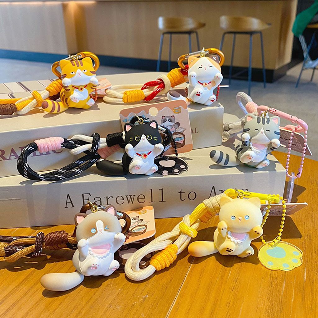 Cute lively cat keychain charms showing all six designs