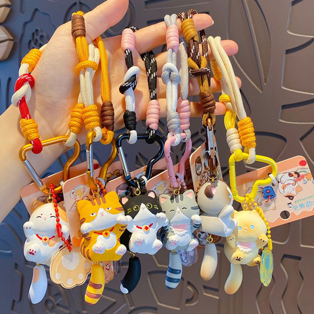 Cute lively cat keychain charms showing multiple designs