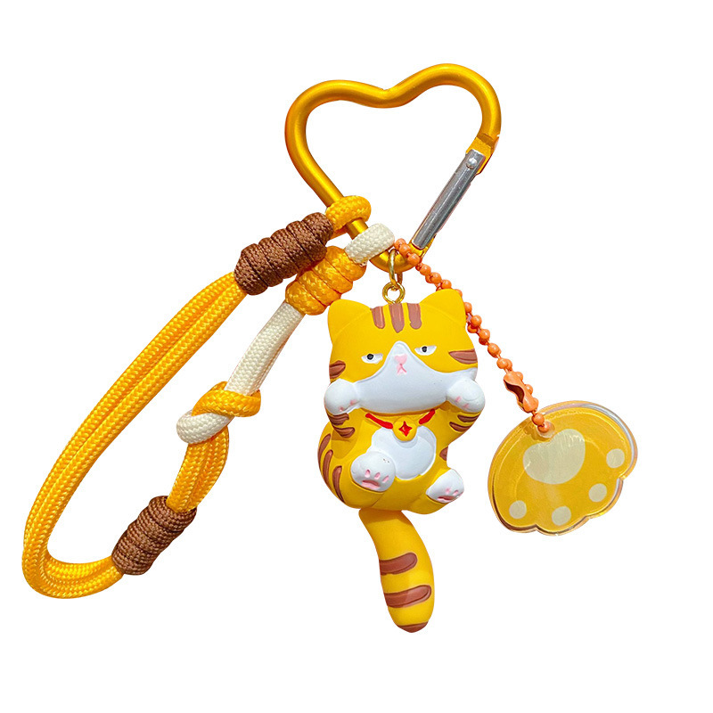 Orange cat keychain charm on white background