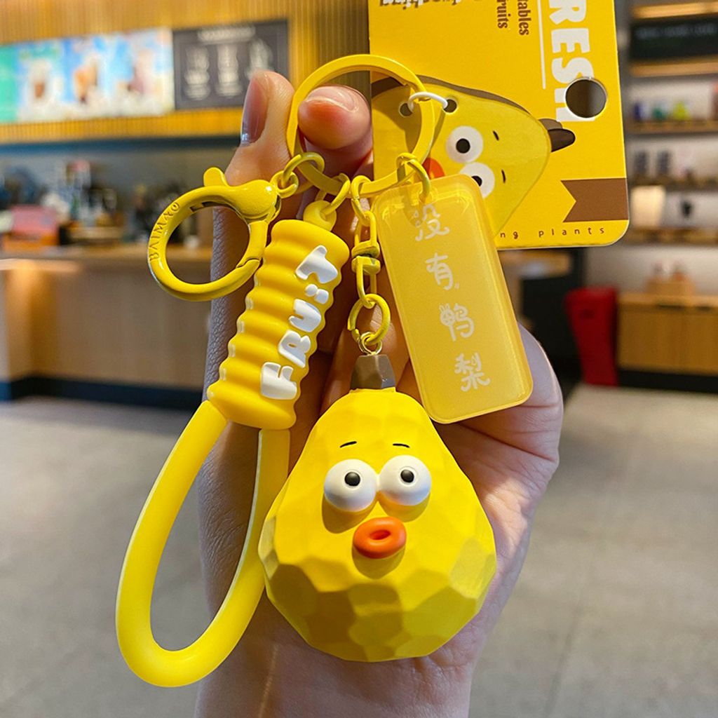 Cute wacky fresh fruit and vegetable wood carving style keychain charm pear variant