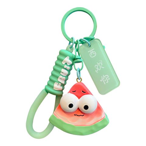 Watermelon keychain charm on white background