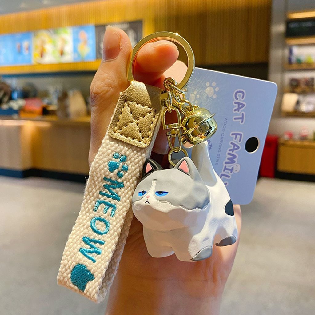 Cute cat family wood carving style keychain charm Blue and White Cat variant
