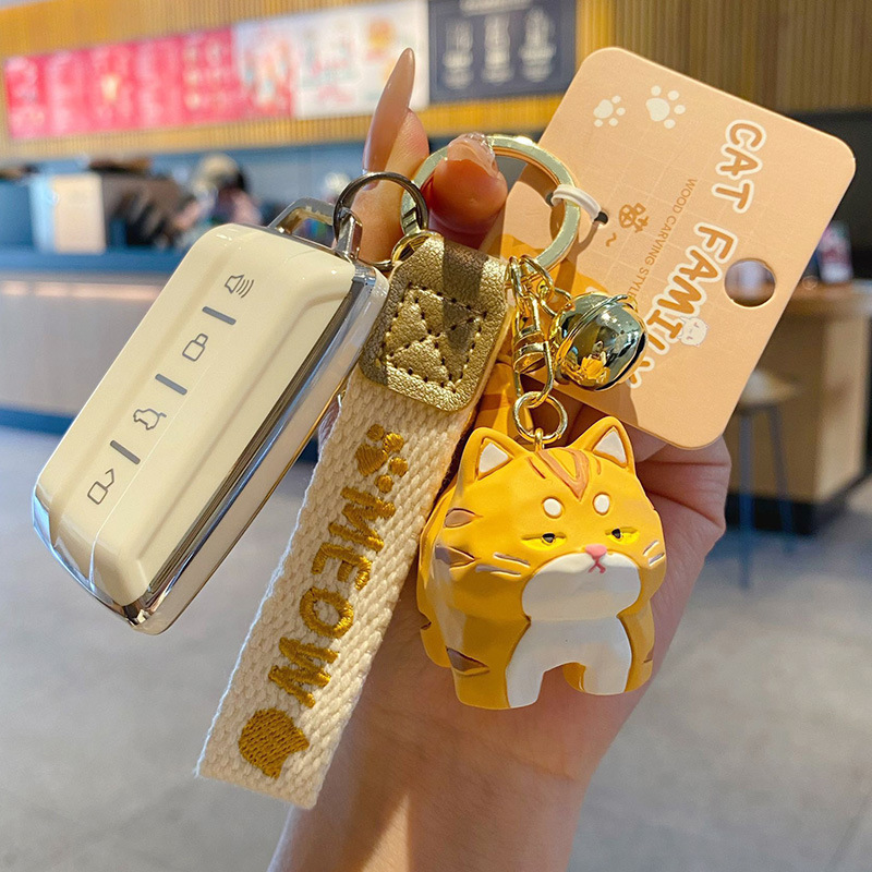 Bengal cat standing keychain charm attached to a car key fob