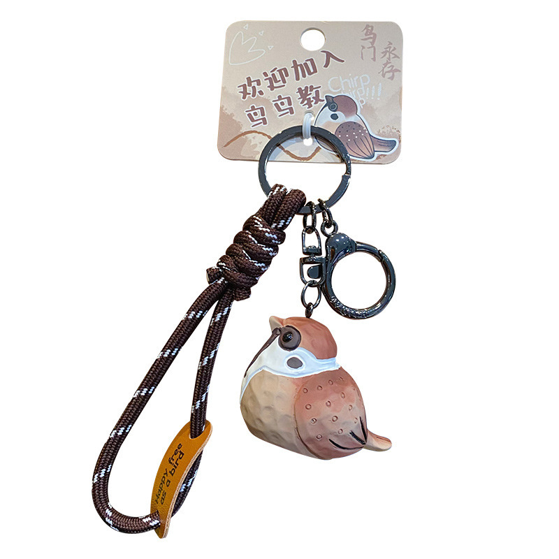 Tree sparrow keychain charm on white background