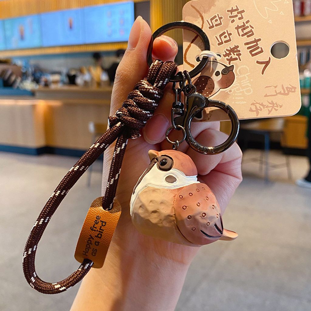 Cute chirpy bird wood carving style keychain charm tree sparrow variant