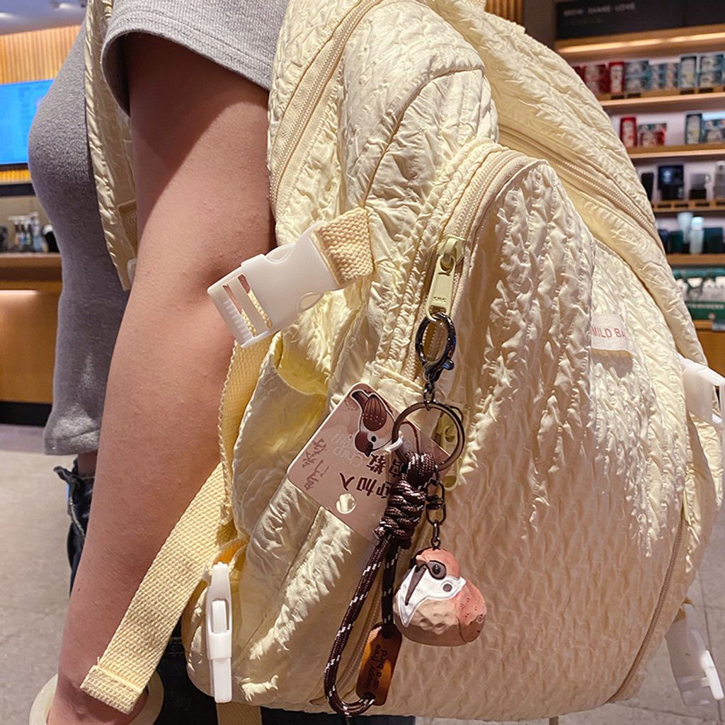 Cute chirpy bird wood carving style keychain charm tree sparrow design hanging on bag