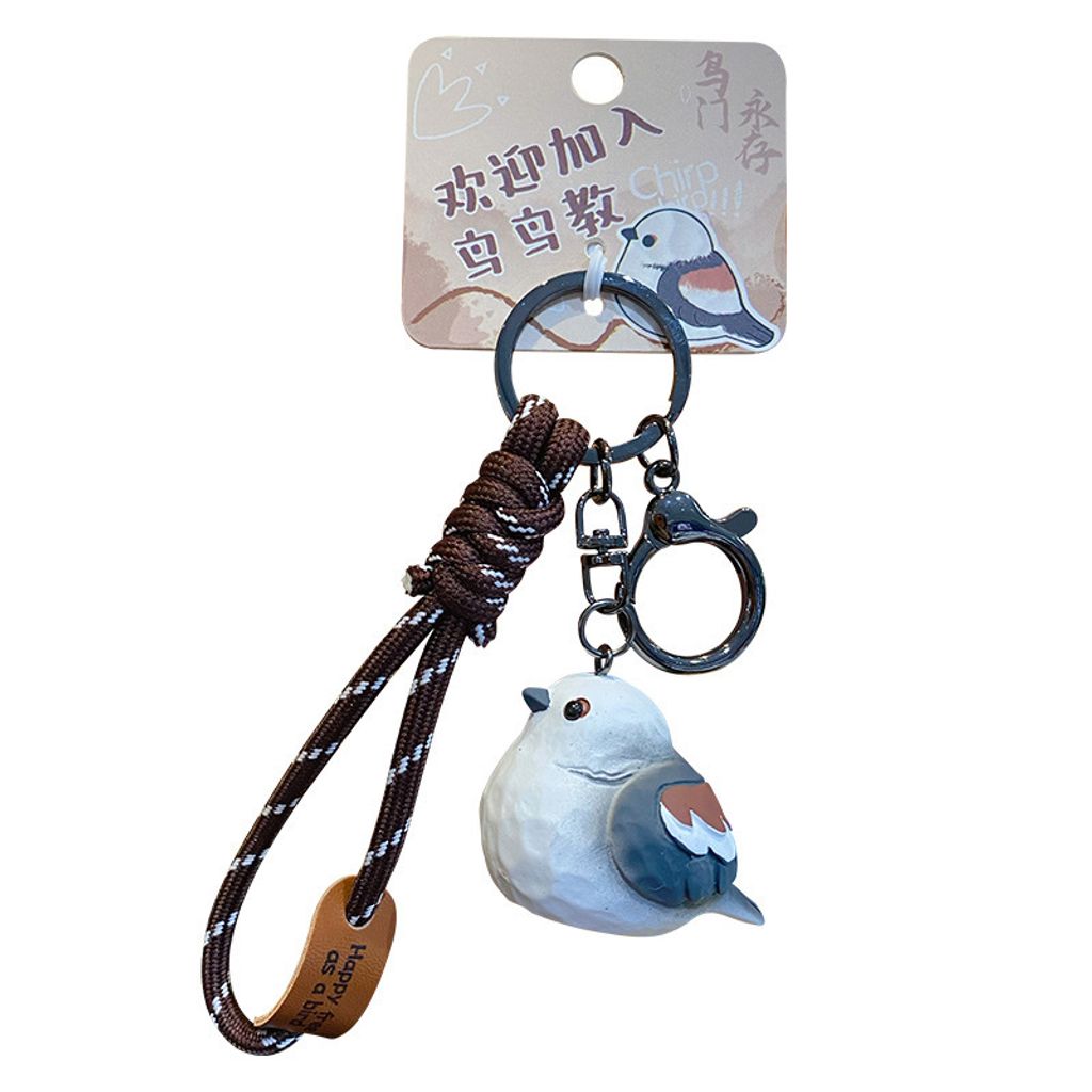 Cute chirpy bird wood carving style keychain charm long-tailed tit design on white background