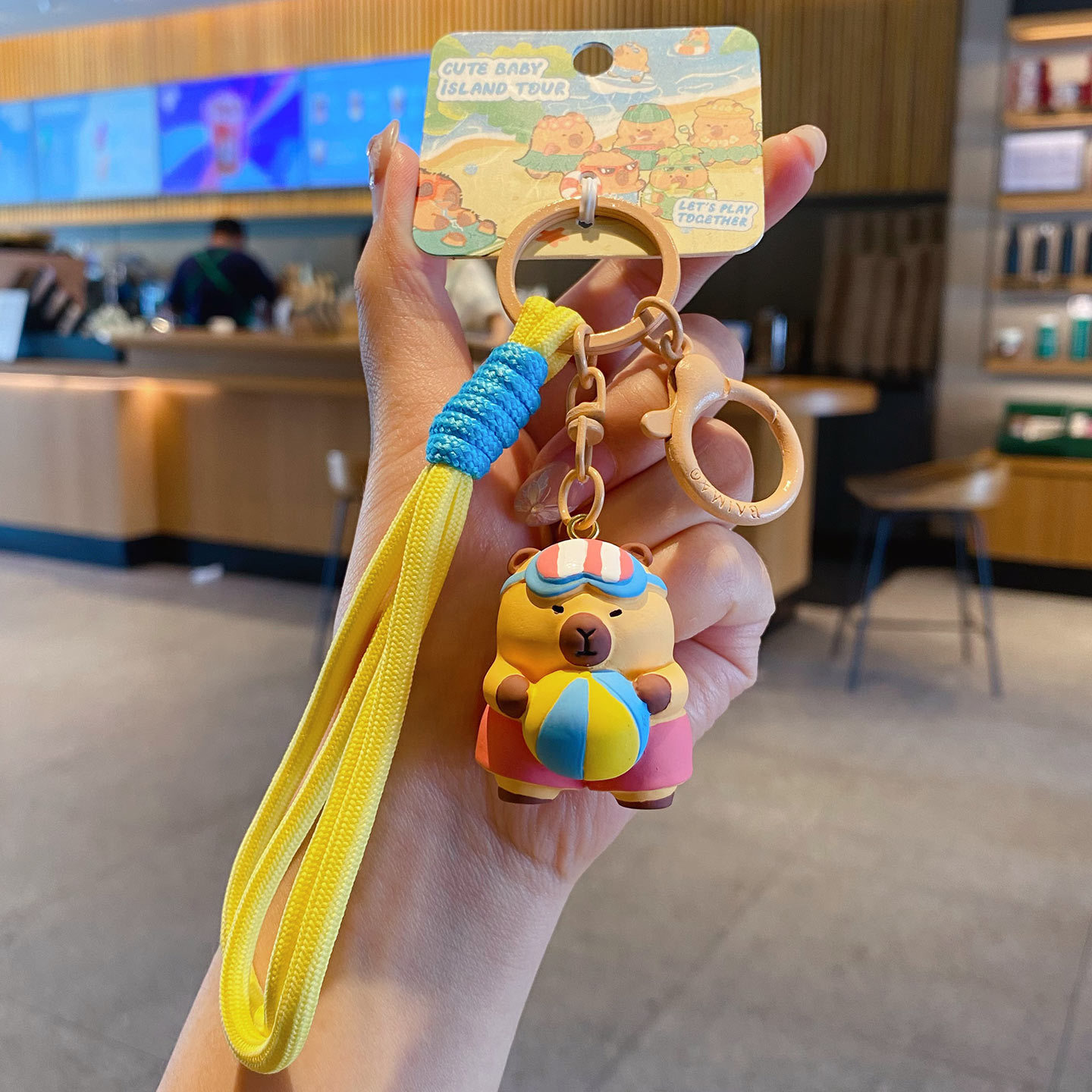 Beach ball capybara keychain charm