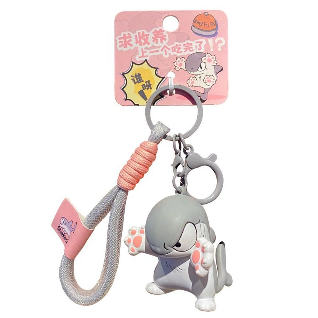 Sharkitty please adopt me keychain charm on white background